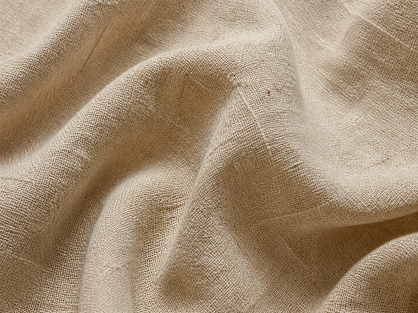 Close-up of natural flax linen with a visible slub weave